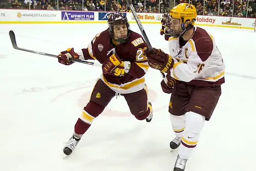Photo By: Jim Rosvold 24-25 Jan 14: Caleb Herbert (Minnesota Duluth - 21), Nate Condon (Minnesota - 16). Scenes from the inaugural North Star College Cup at the Xcel Energy Center in St. Paul, MN. (Jim Rosvold)