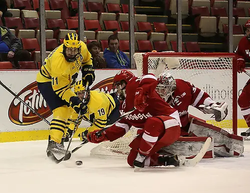 Michigan's high-scoring line does a number on Wisconsin ...