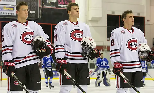 Photo By: Bradley K. Olson Jack Poehling (SCSU-3) Ryan Poehling (SCSU-11) Nick Poehling (SCSU8) Nathan Widman (SCSU-5) 16 October 28 Alabama Huntsville and St. Cloud State University meet in a non conference contest at the Herb Brooks National Hockey Center (Bradley K. Olson)