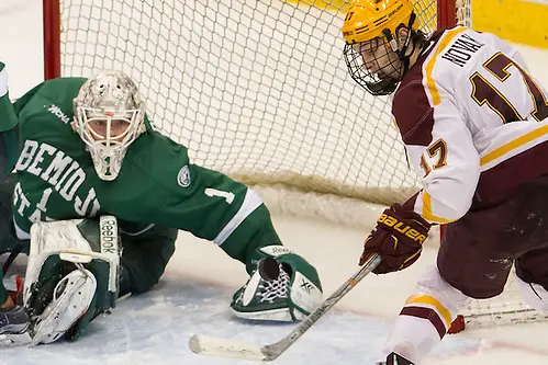 Photo By: Jim Rosvold 23 Jan 16: Michael Bitzer (Bemidji State - 1), Tommy Novak (Minnesota -17). The University of Minnesota Golden Gophers play against the Bemidji State University Beavers in a North Star College Cup semifinal matchup at the Xcel Energy Center in St. Paul, MN. (Jim Rosvold)