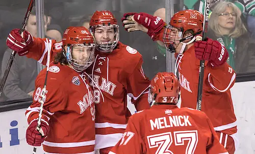 Photo By: Bradley K. Olson Anthony Louis (Miami of Ohio-95) Carson Meyer (Miami of Ohio-18) Josh Melnick (Miami of Ohio-37) 17 Jan.14 Miami of Ohio Redhawks and University of North Dakota meet in a NCHC conference match-up at the Engelsted Arena Grand Forks, ND (Bradley K. Olson)