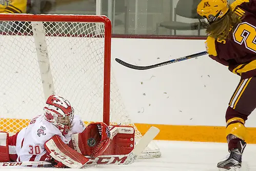 Photo By: Jim Rosvold 06 Mar 16: Ann-Renee Desbiens (Wisconsin - 30), Lee Stecklein (Minnesota - 2). The University of Wisconsin Badgers play against the University of Minnesota Golden Gophers in the 2016 WCHA Final Face-Off Championship Game at Ridder Arena in Minneapolis, MN.UC (Jim Rosvold)