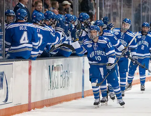 Photo By: Omar Phillips Air Force players celebrate a second period goal in a 3-2 win at RIT (Omar Phillips)