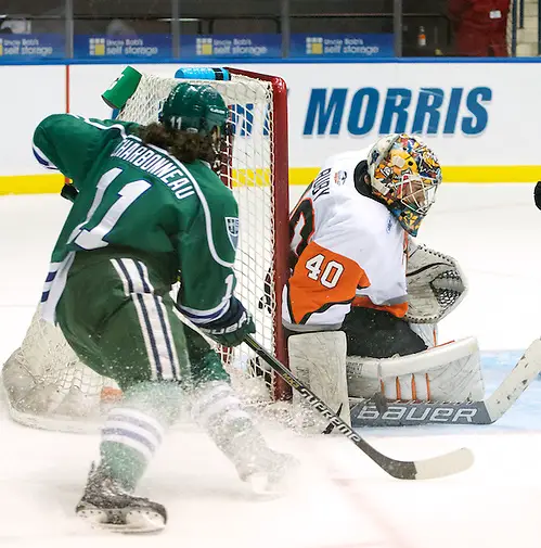 Photo By: Omar Phillips Jordan Ruby (40 - RIT) makes a save on a shot by Jonathan Charbonneau (11 - Mercyhurst) (Omar Phillips)
