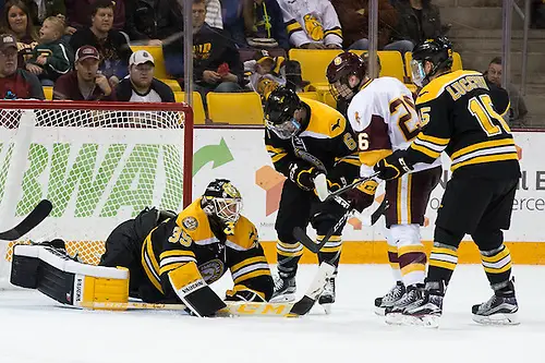 Photo By: Jim Rosvold/USCHO.com 01 Oct 16: Matt Wintjes (Michigan Tech - 35), Chris Leibinger (Michigan Tech - 6), Jade Miller (Minnesota Duluth - 26), Jake Lucchini (Michigan Tech - 15). The University of Minnesota Duluth Bulldogs host the Michigan Technological University Huskies in a non-conference matchup at Amsoil Arena in Duluth, MN. (Jim Rosvold/USCHO.com)
