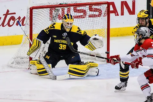Photo By: Rachel Lewis FEB 25, 2017: Zach Nagelvoort (UM - 35), Nick Schilkey (OSU - 7), Luke Martin (UM - 2). The #12 Ohio State Buckeyes get shut out 1-0 by the University of Michigan Wolverines at the Schottenstein Center in Columbus, OH. (Rachel Lewis)