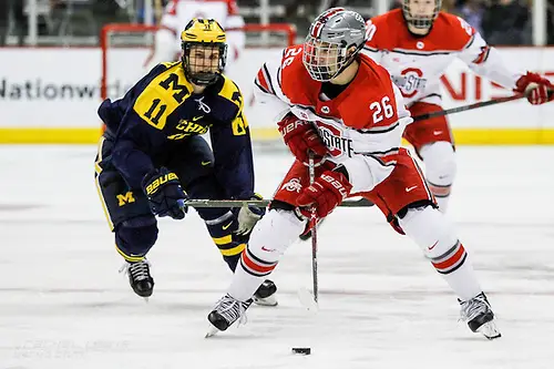 Photo By: Rachel Lewis FEB 25, 2017: Mason Jobst (OSU - 26), Brendan Warren (UM - 11). The #12 Ohio State Buckeyes get shut out 1-0 by the University of Michigan Wolverines at the Schottenstein Center in Columbus, OH. (Rachel Lewis)