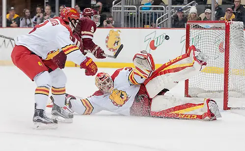 Photo By: Omar Phillips Justin Kapelmaster (35 - Ferris State) stacks the pads as a shot by Austin Cangelosi (9 - Boston College) sails just wide (Omar Phillips)