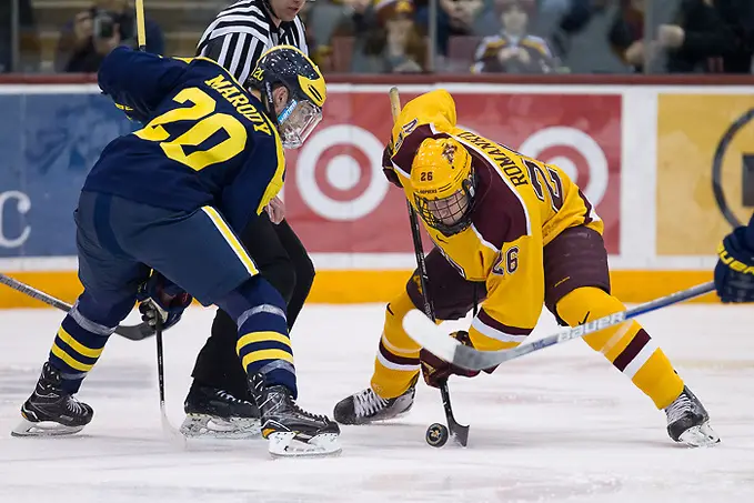 Photo By: Jim Rosvold 14 Jan 16: Cooper Marody (Michigan - 20), Darian Romanko (Minnesota - 26). The University of Minnesota Golden Gophers host the University of Michigan Wolverines in a B1G matchup at Mariucci Arena in Minneapolis, MN. (Jim Rosvold)