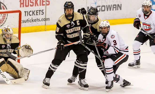 Photo By: Bradley K. Olson Scott Moldenhauer (Western Michigan-15) Jack Poehling (SCSU-3) 2018 Jan. 12 The St.Cloud State University Huskies host Western Michigan in a NCHC matchup at the Herb Brooks National Hockey Center in St. Cloud, MN (Bradley K. Olson)