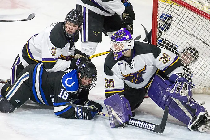 Photo By: Jim Rosvold 15 Dec 17: Jack McNeely (Minnesota State - 3), Austin Beaulieu (Alabama-Huntsville - 18), Jason Pawloski (Minnesota State - 39). The Minnesota State University Mavericks host the University of Alabama-Huntsville in the a WCHA matchup at Verizon Wireless Center in Mankato, MN. (Jim Rosvold)