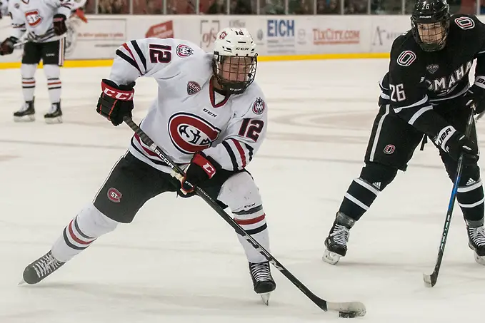 Photo By: Bradley K. Olson Jack Ahcan (SCSU-12) 2018 Feb. 02 St. Cloud State University hosts University of Nebraska Omaha in a NCHC contest at the Herb Brooks National Hockey Center in St. Cloud, MN (Bradley K. Olson)