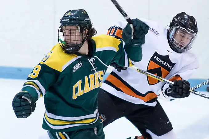 Photo By: Shelley M. Szwast Aaron Kesselman (Princeton - 11) and Brett Gervais (Clarkson - 19) collide at the blue line. (Shelley M. Szwast)