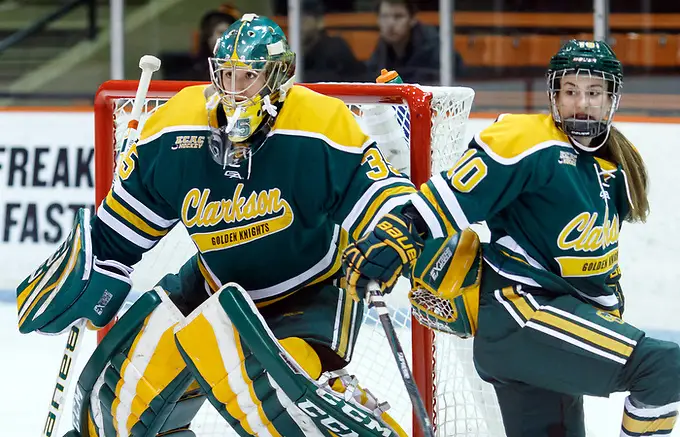 Photo By: (c) Shelley M. Szwast 2016 Shea Tiley (Clarkson - 35) and Michaela Pejzlova (Clarkson - 10) defend the net. ((c) Shelley M. Szwast 2016)