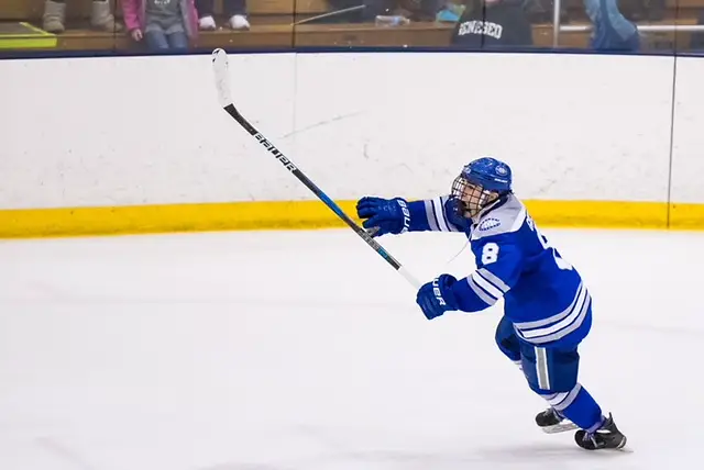 Colby v Geneseo Justin Grillo #8 of Colby Mules celebrates scoring the game winning goal with 1.6 seconds remaining in the third period against the Geneseo Knights at the NCAA Division III men's ice hockey Tournament Second-Round between the Geneseo Knights and the Colby Mules on March 17, 2018. Collby defeats Geneseo 2-1. Photograph by Brett Carlsen for Colby College. (Brett Carlsen)
