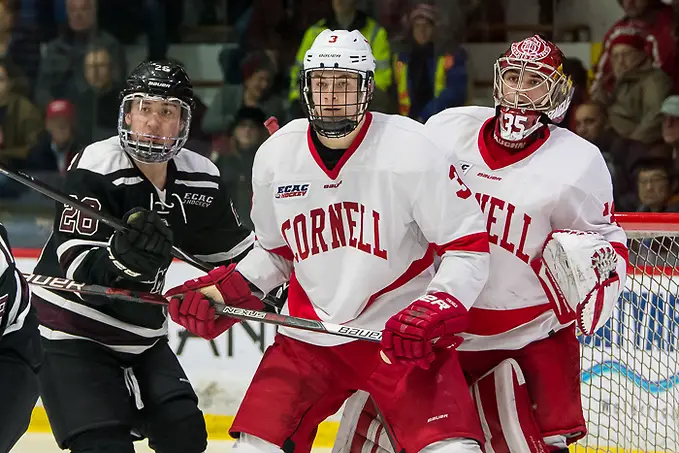 Photo By: 2018 Omar Phillips Josh Kosack (26 - Union), Cody Haiskanen (3 - Cornell), Matthew Galajda (35 - Cornell) (2018 Omar Phillips)