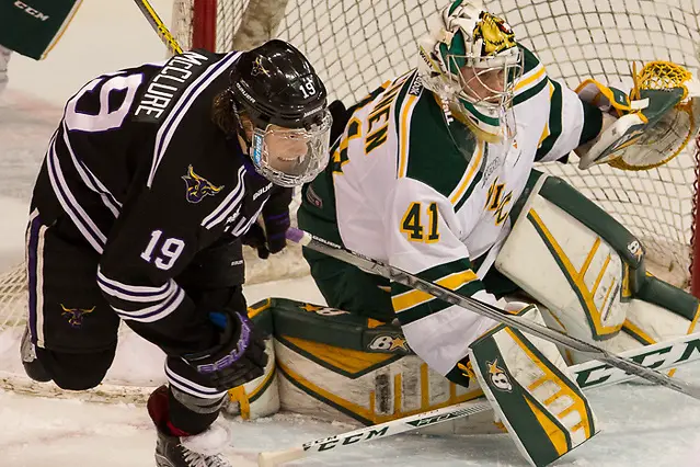 Photo By: Jim Rosvold 8 Jan 16: Brad McClure (Minnesota State - 19), Ate Tolvanen (Northern Michigan - 41). The Minnesota State University Mavericks host the Northern Michigan University Wildcats in a WCHA conference matchup at Verizon Wireless Center in Mankato, MN. (Jim Rosvold)