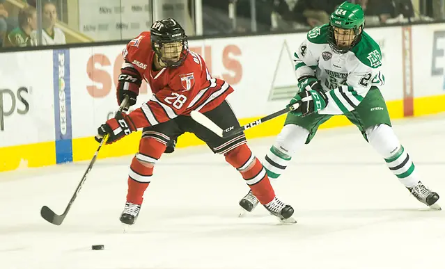 Photo By: Bradley K. Olson Jesper Öhrvall (RPI-28) Christian Wolanin (North Dakota-24) 16 October 15 RPI and University of North Dakota meet in a non conference contest at the Ralph Engelstad Arena in Grand Forks, ND (Bradley K. Olson)
