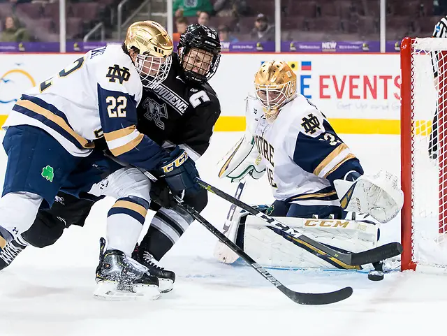 Photo By: 2018 Omar Phillips Kasper Björkqvist (20 - Providence), Andrew Peeke (22 - Notre Dame), Cale Morris (32 - Notre Dame) (2018 Omar Phillips)