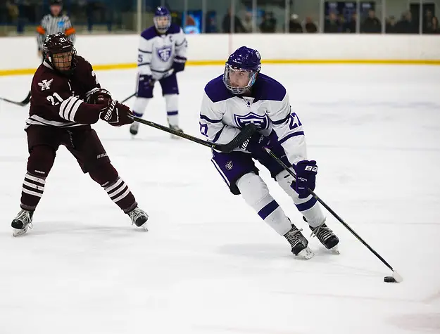 Men's Hockey vs Augsburg MIAC Championship Brett Gravelle skates past a defender during a men's hockey MIAC Championship game versus Augsburg March 4, 2017 at the St. Thomas Ice Arena in Mendota Heights. The Tommies fell to the Auggies 2-3. (Mike Ekern/University of St. Thomas)