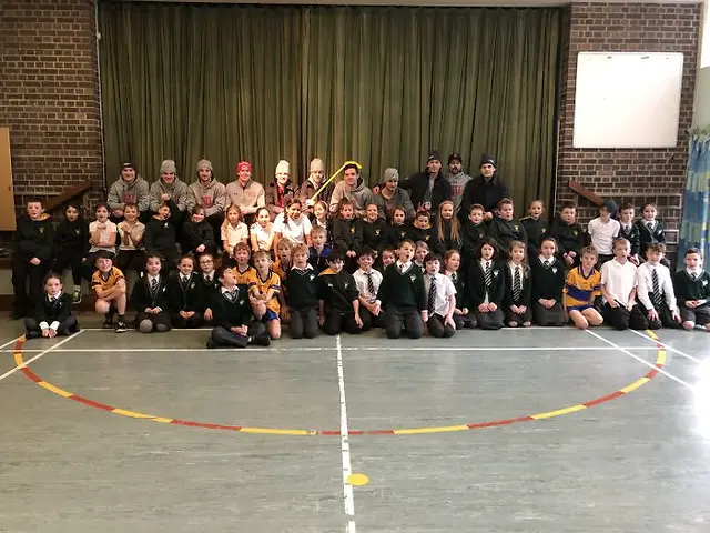 Photo By: photo: Boston University Athletics Boston University players at St. Patrick's Primary School in Holywood (same school Rory McIlroy attended as a child). (photo: Boston University Athletics)