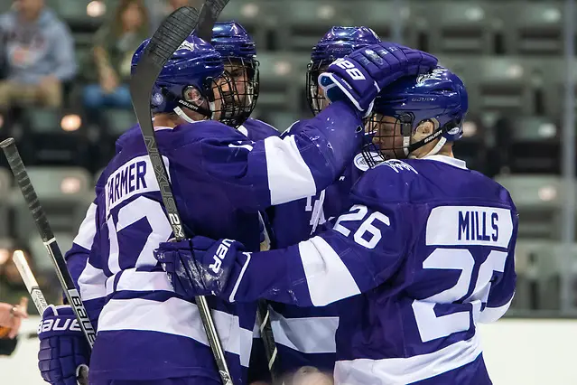Photo By: 2018 Omar Phillips Niagara players celebrate a first period goal by Nick Farmer (12 - Niagara University) (2018 Omar Phillips)