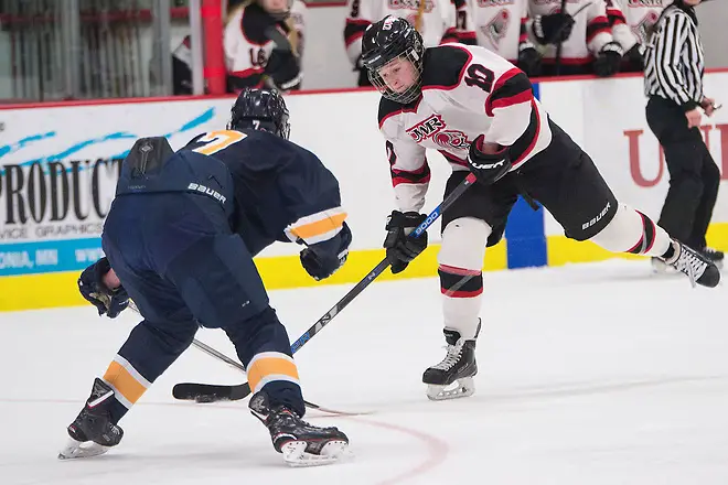 Womens Hockey VS Eau Claire_OBrien Cup_03032018_TS Callie Hoff (10) takes a shot in the second period against UW-Eau Claire in the O'Brien Cup game at Hunt Arena Saturday, March 3, 2018. Womens Hockey VS Eau Claire_OBrien Cup_03032018_TSWomens Hockey VS Eau Claire_OBrien Cup_03032018_TS (Tori Schneider)