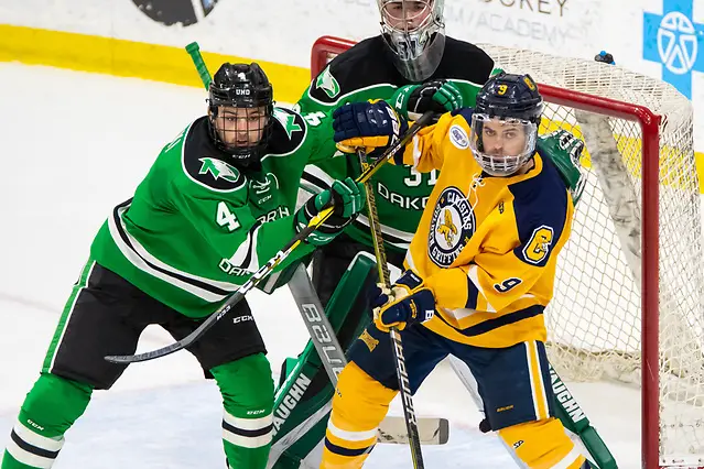 Photo By: 2019 Omar Phillips Andrew Peski (4 - North Dakota), David Parrottino (9 - Canisius) (2019 Omar Phillips)