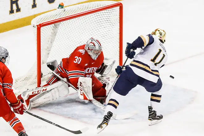 Photo By: Rachel Lewis/©Rachel Lewis 17 MAR 2018: Sean Romeo (OSU - 30), Cal Burke (ND - 11). The University of Notre Dame Fighting Irish host the Ohio State University in the 2018 B1G Championship at Compton Family Ice Arena in South Bend, IN. (Rachel Lewis - USCHO) (Rachel Lewis/©Rachel Lewis)
