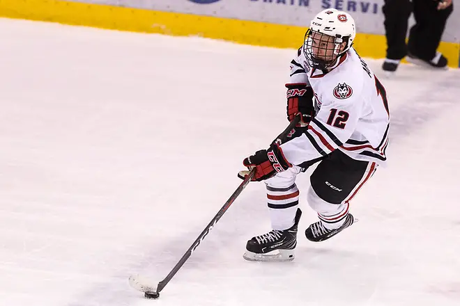 Photo By: Bradley K. Olson Jack Ahcan (SCSU-12) 2018 December 8 St.Cloud State University hosts University of Nebraska Omaha in a NCHC contest at the Herb Brooks National Hockey Center (Bradley K. Olson)