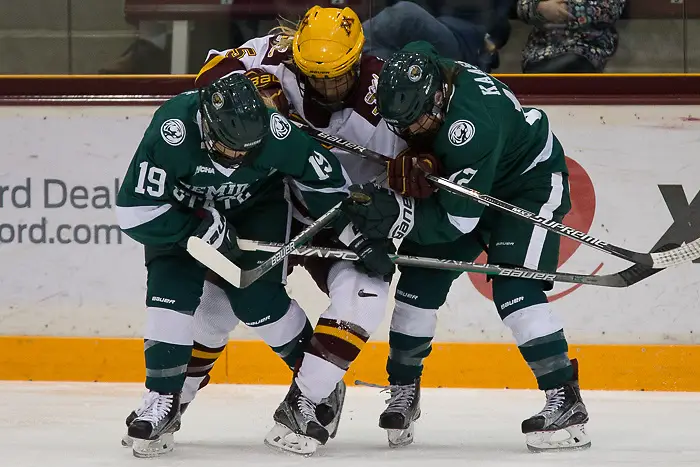 Photo By: Jim Rosvold/USCHO.com 16 Nov 16: Haley Mack (Bemidji St. - 19), Sophie Skarzynski (Minnesota - 5), Jacqueline Kaasa (Bemidji St. - 12). The University of Minnesota Golden Gophers host the Bemidji State Beavers in a WCHA matchup at Ridder Arena, in Minneapolis, MN. (Jim Rosvold/USCHO.com)