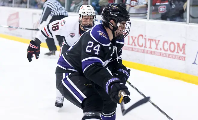 Photo By: Bradley K. Olson Edwin Hookenson (MSU-24) Judd Peterson (SCSU-18) 2018 Jan. 12 The St.Cloud State University Huskies host Mankato State University n a non conference matchup at the Herb Brooks National Hockey Center in St. Cloud, MN (Bradley K. Olson)